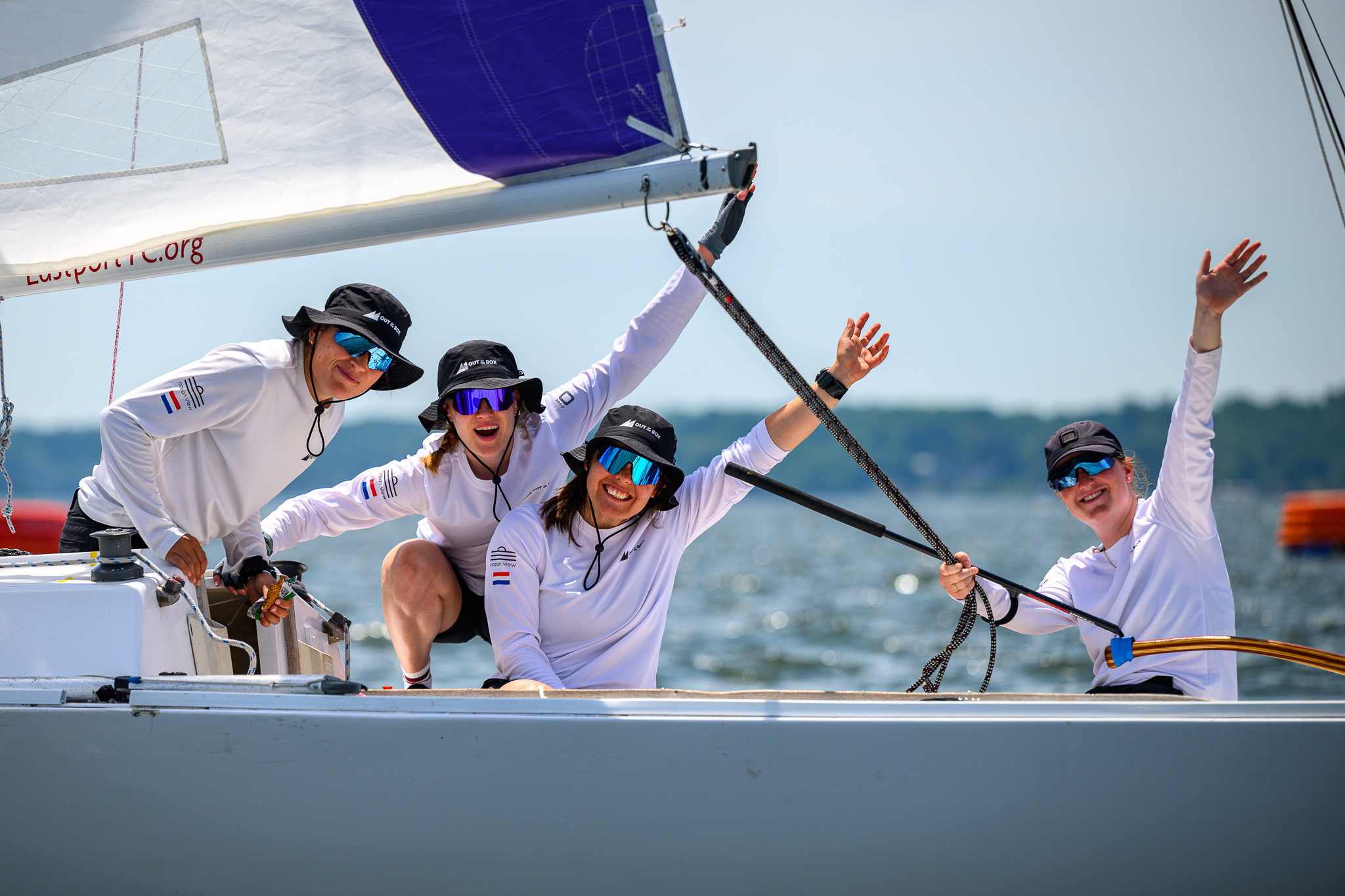 Sailor celebrating with arms raised